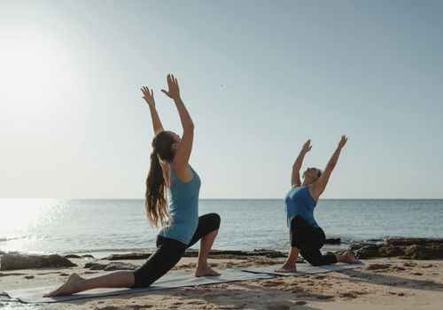 Person doing chair yoga in office setting