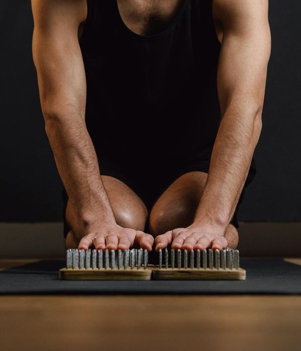 Person practicing yoga for balance and mindfulness indoors